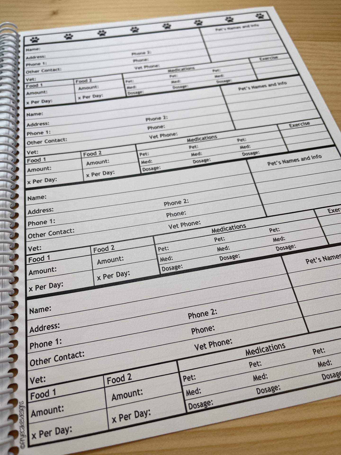 2025-2026 Pet Sitter Planner & Organizer with Pet and Owner Info Pages.  Large or Medium.  BLACK PAW PRINTS DESIGN DESIGN